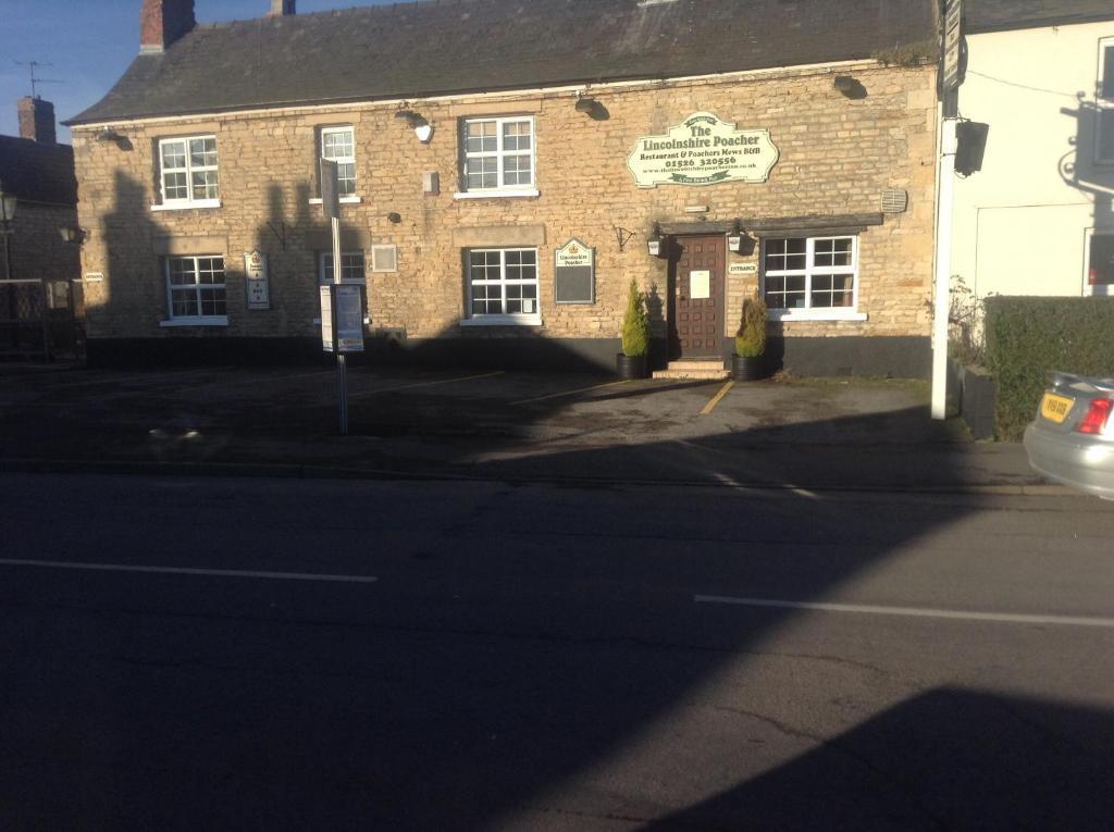The Lincolnshire Poacher Inn Metheringham Exterior foto